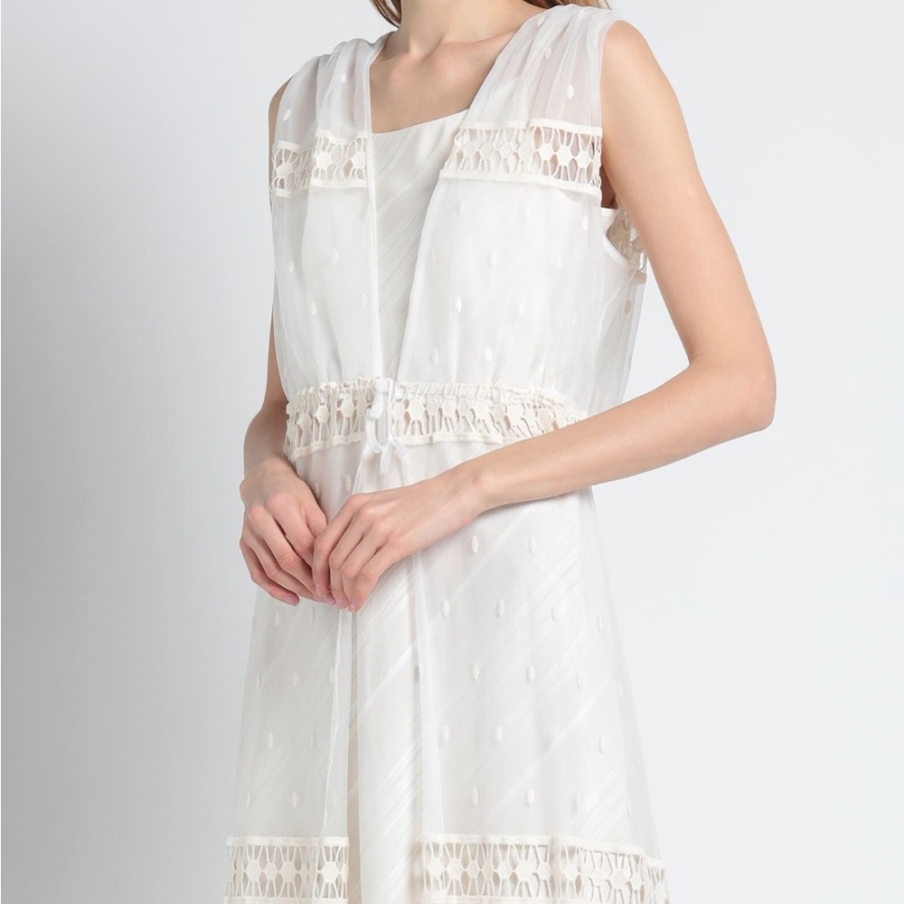 Elegant White Sleeveless Dress